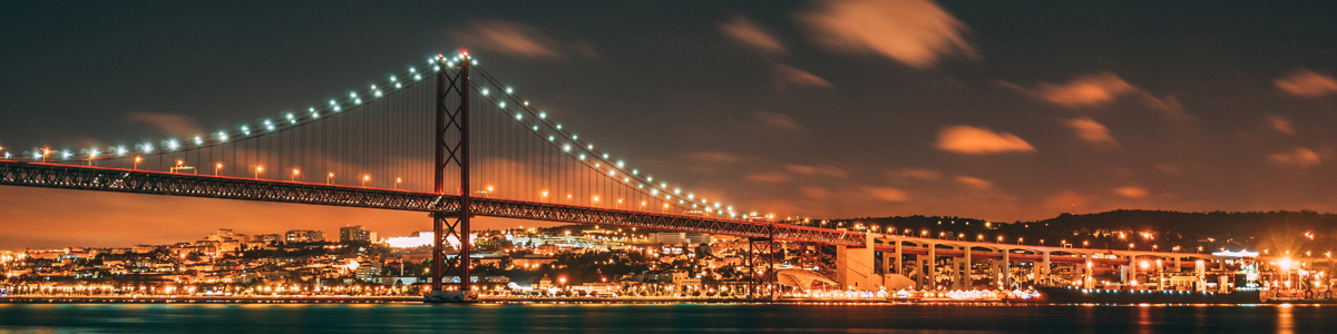 Lisbon at night, Photo by Fulvio Ambrosanio on Unsplash